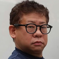 担当